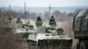 Отвод тяжелых вооружений из Оленовки, Донецкая область Украины 